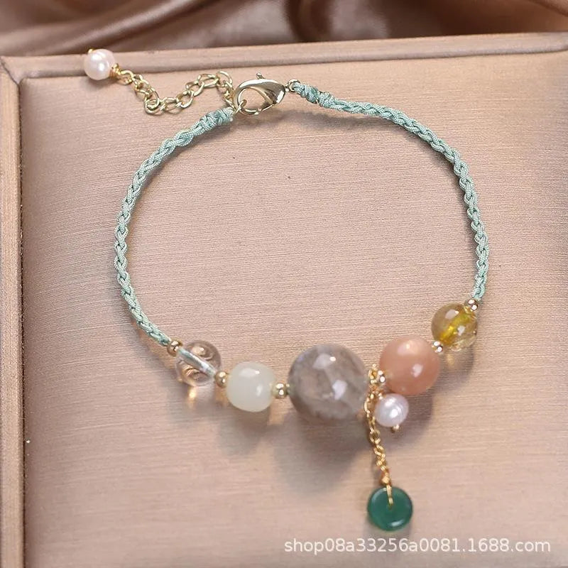Hand-woven crystal peace buckle bracelet for women with sequins in red, green, and blue colours