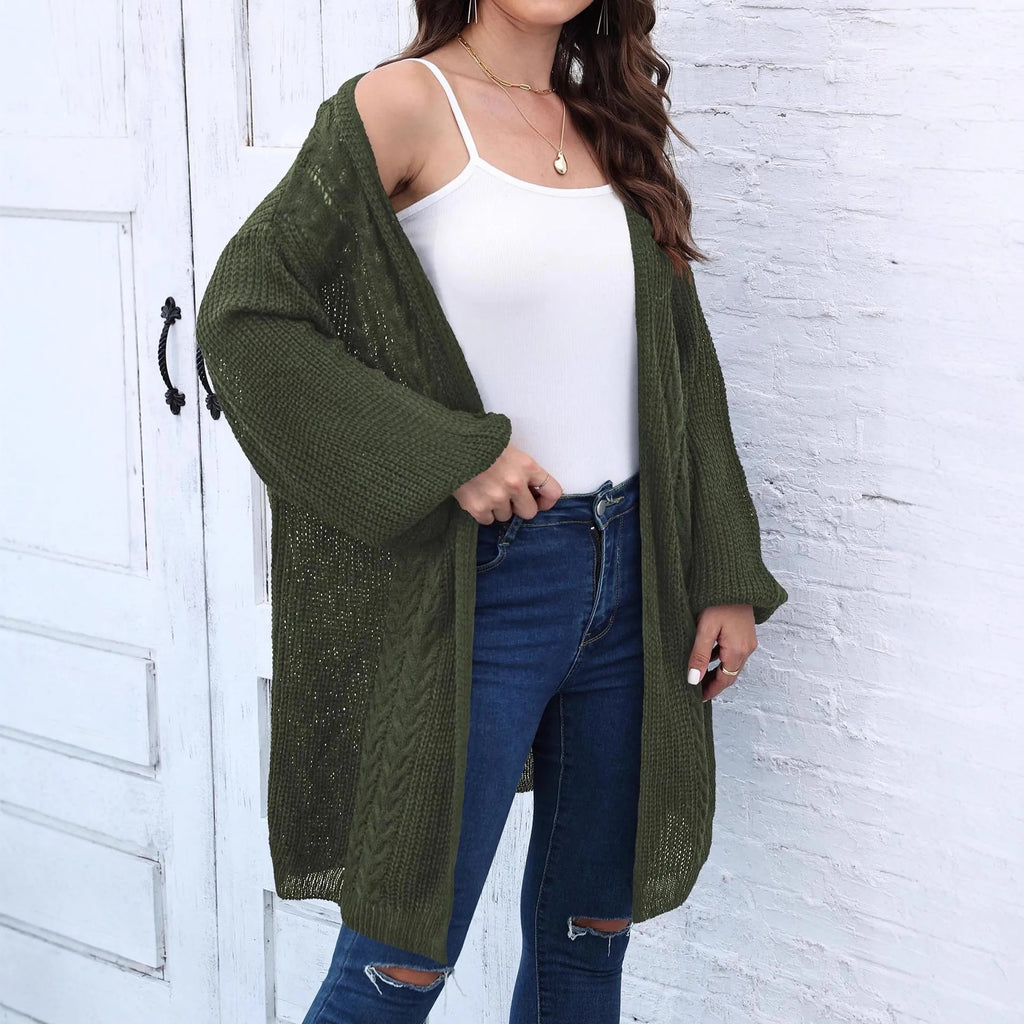 Women's loose fit acrylic sweater coat in army green, shown on a hanger.