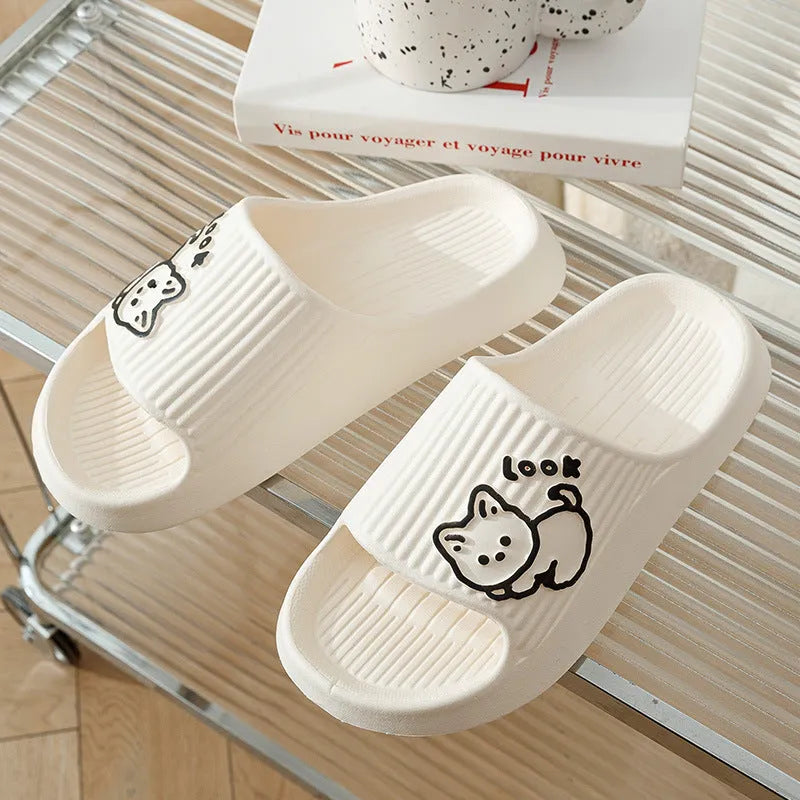 Green EVA platform slippers with a cat design on the upper, showing the thick non-slip sole.