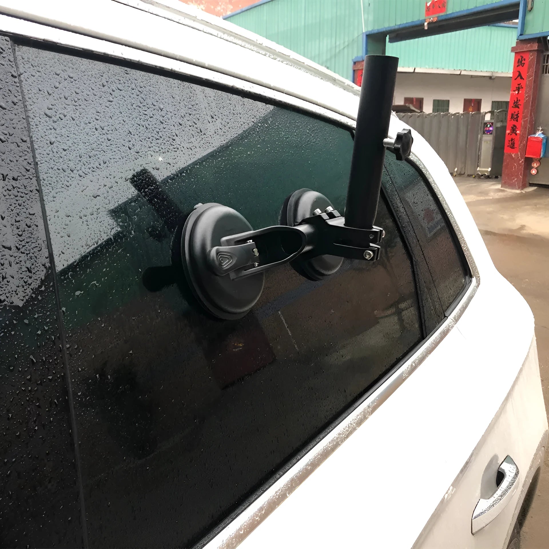 Black off-road car flagpole sucker base with round rubber suction cup and ABS plastic body.