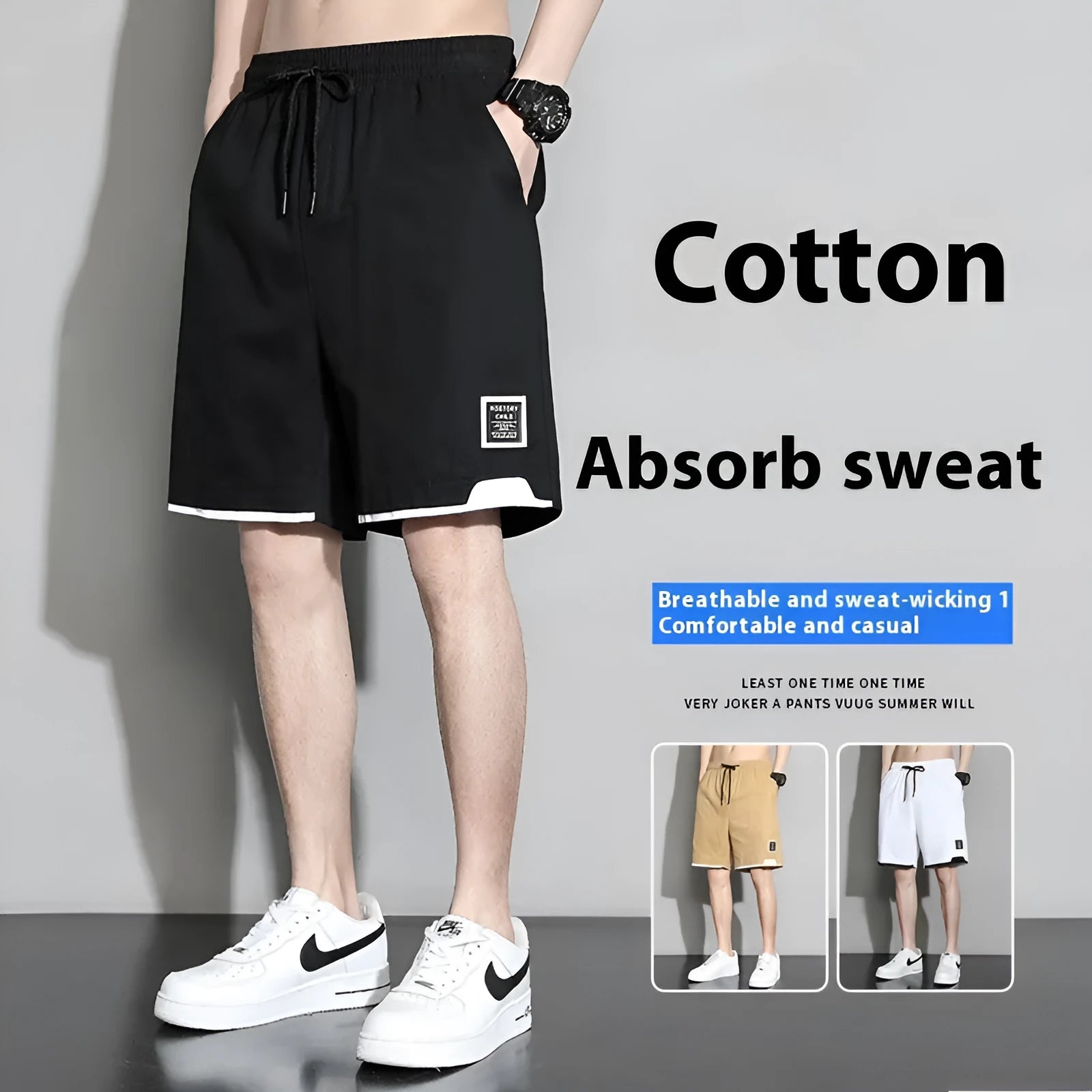 Boys' plus size cotton shorts in black, shown flat, featuring a mid waist and shorts length design.