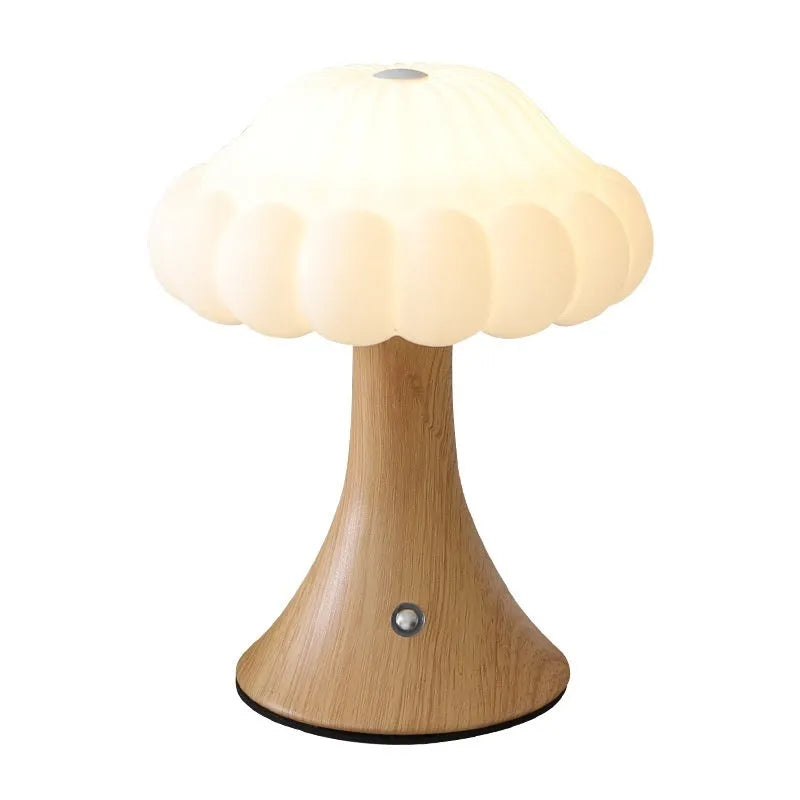 Small mushroom-shaped night lamp in wood grain colour with USB charging port and touch control.