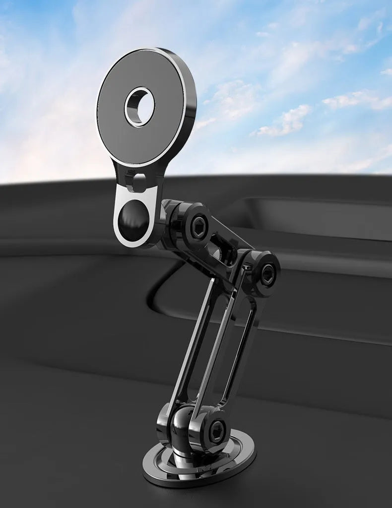 Black magnetic car phone holder mounted on air vent with smartphone attached