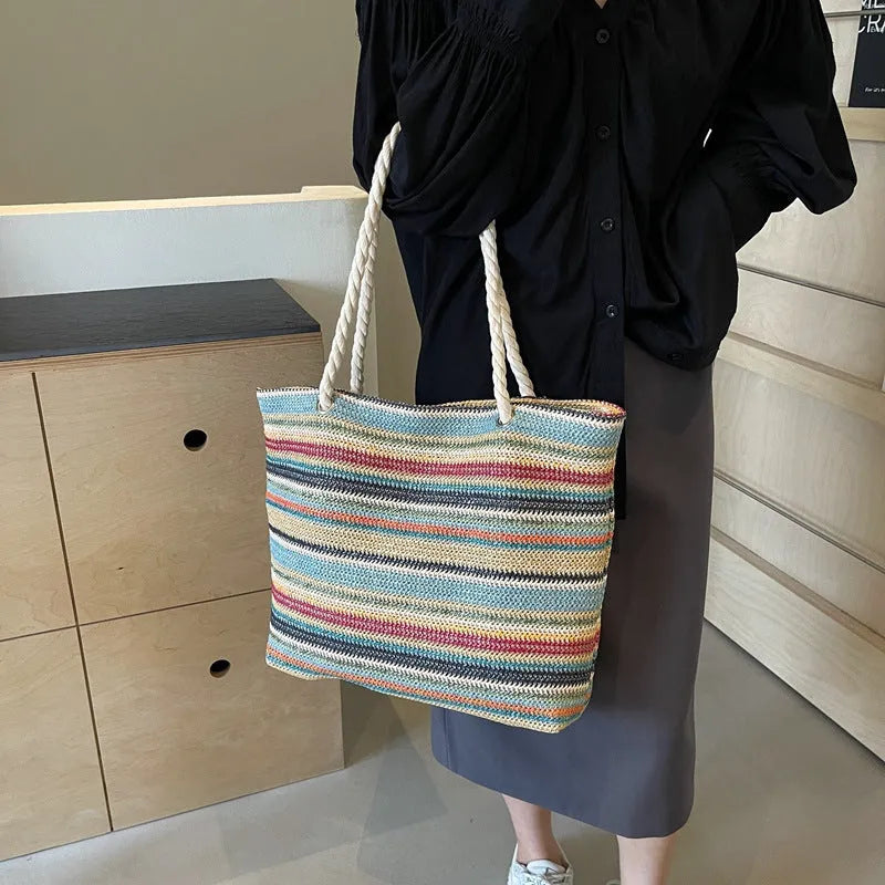 Blue woven nylon shoulder bag with large capacity and a single strap