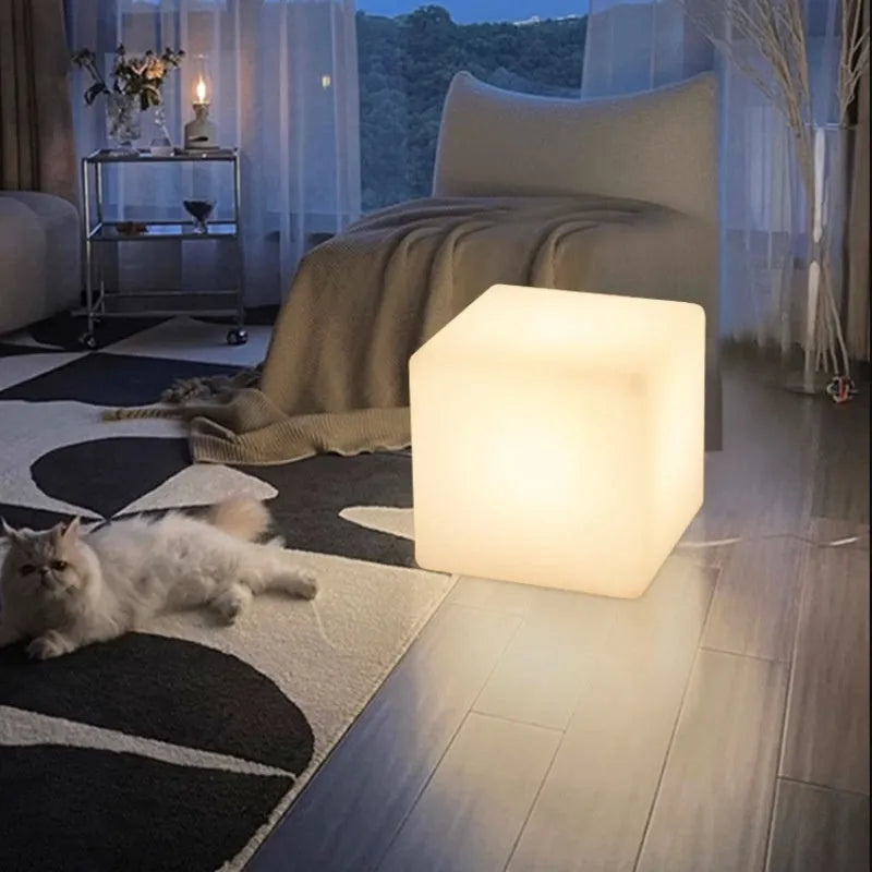 Square LED cube stool light with modern design for outdoor seating and illumination
