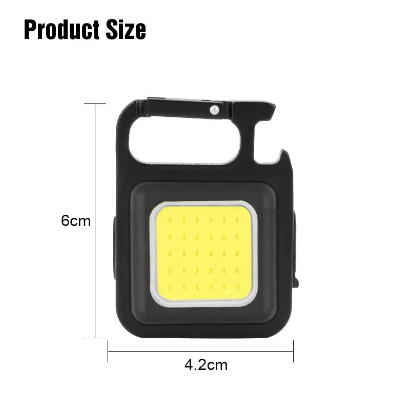 Black aluminium alloy COB keychain light with magnetic base, foldable handle, and key ring, 6x4.2cm