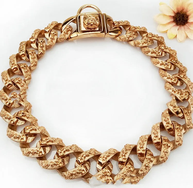 Stainless steel skull dog collar necklace in gold finish with 32mm width and chain links