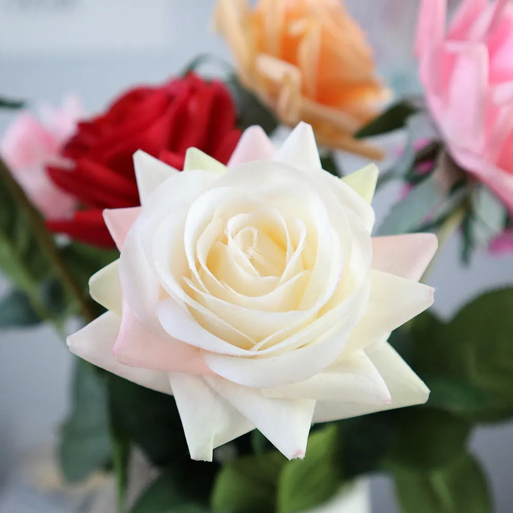 Artificial silk flower bouquet measuring approximately 42cm long with 8.5cm flower heads in multiple colour options