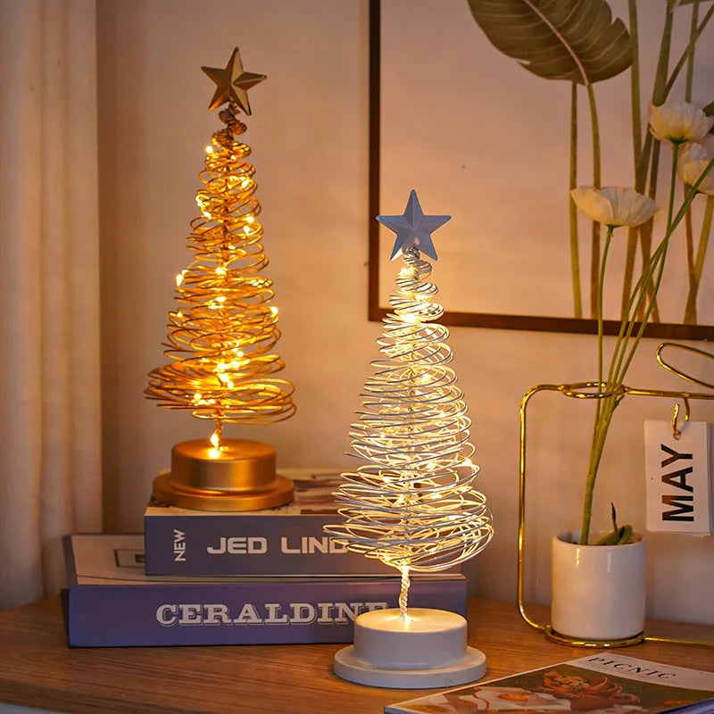 LED Christmas tree spiral light ornament in iron, golden finish, 33cm tall, warm white glow on a tabletop