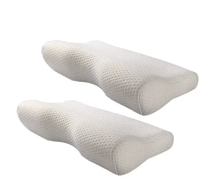Blue memory cotton butterfly cervical pillow with polyester cover on a bed