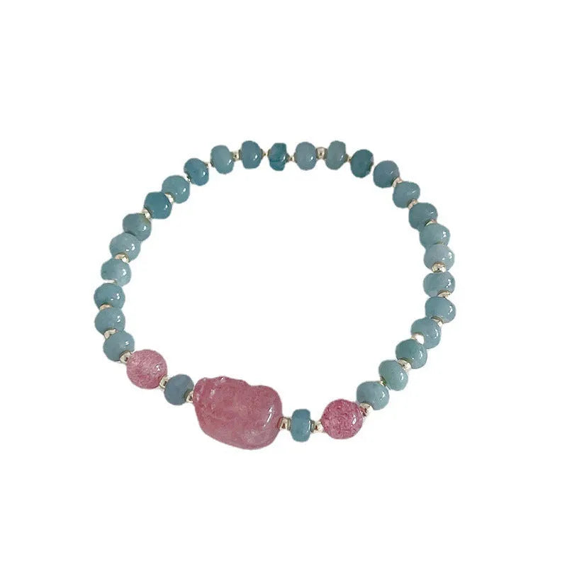 Natural blue water jade bead bracelet with gourd peace buckle design on white background