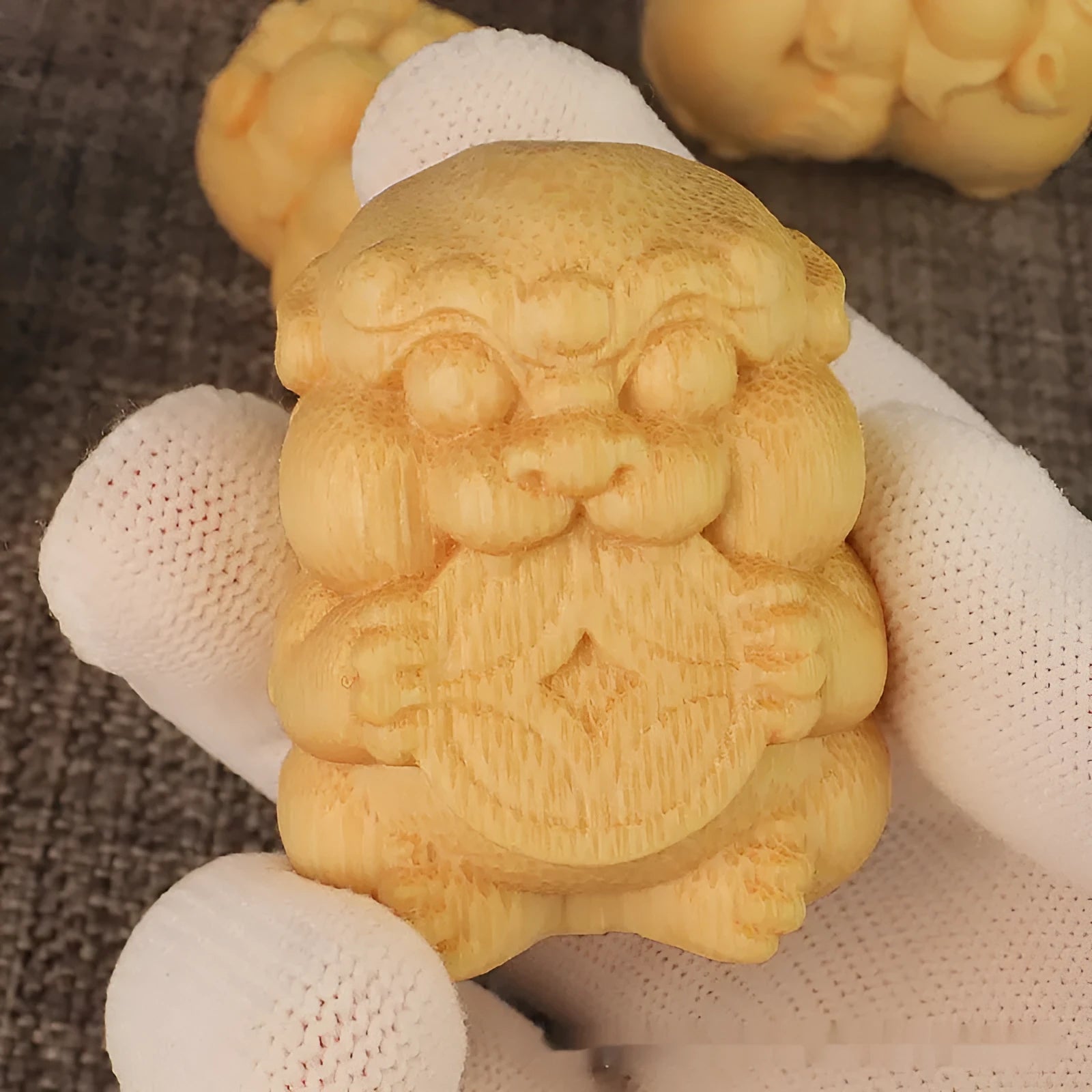 Solid bamboo carving ornament measuring 4.5cm tall by 3.5cm wide with traditional decorative carving