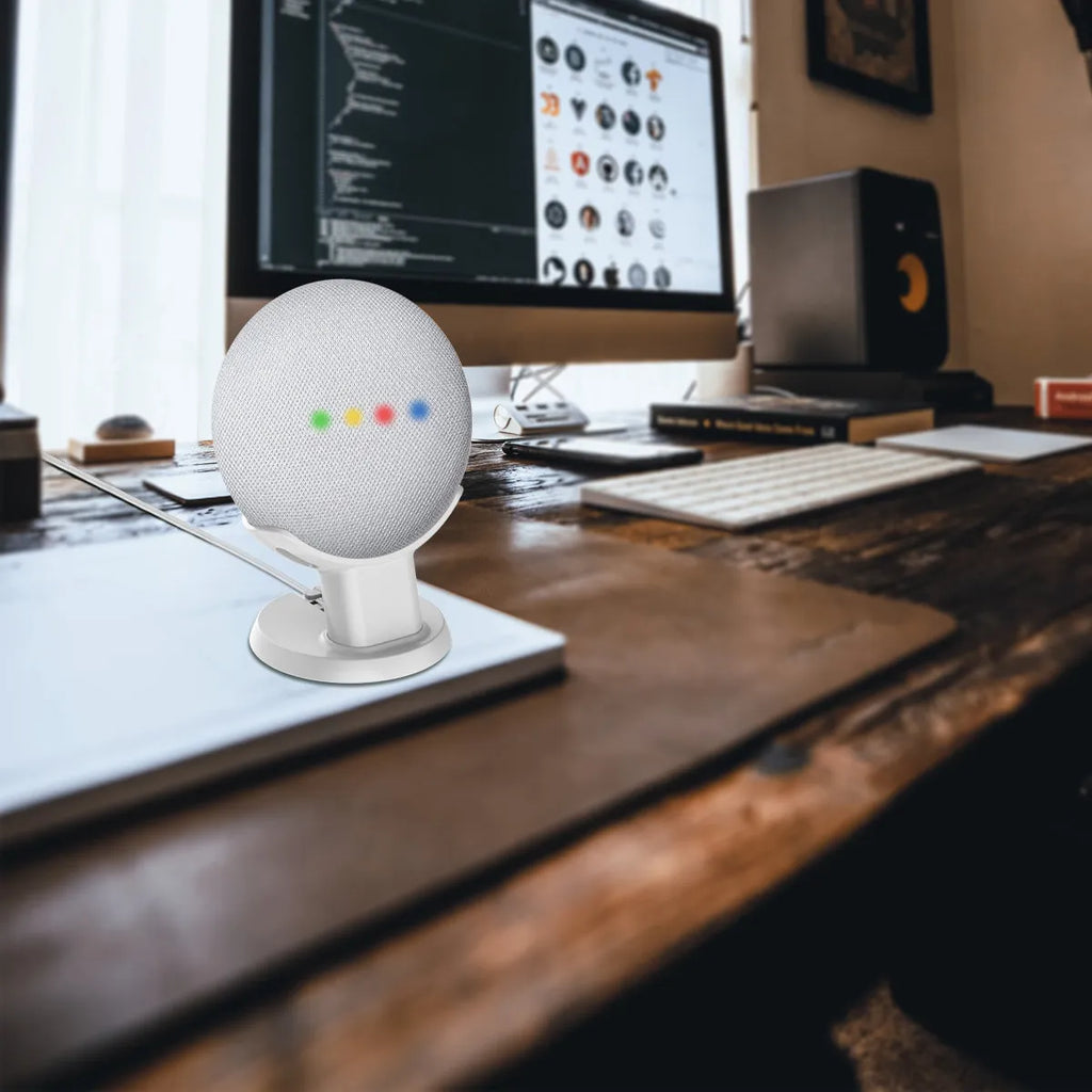 Compact plastic table holder stand for Google Home Mini in black colour with cable slot visible