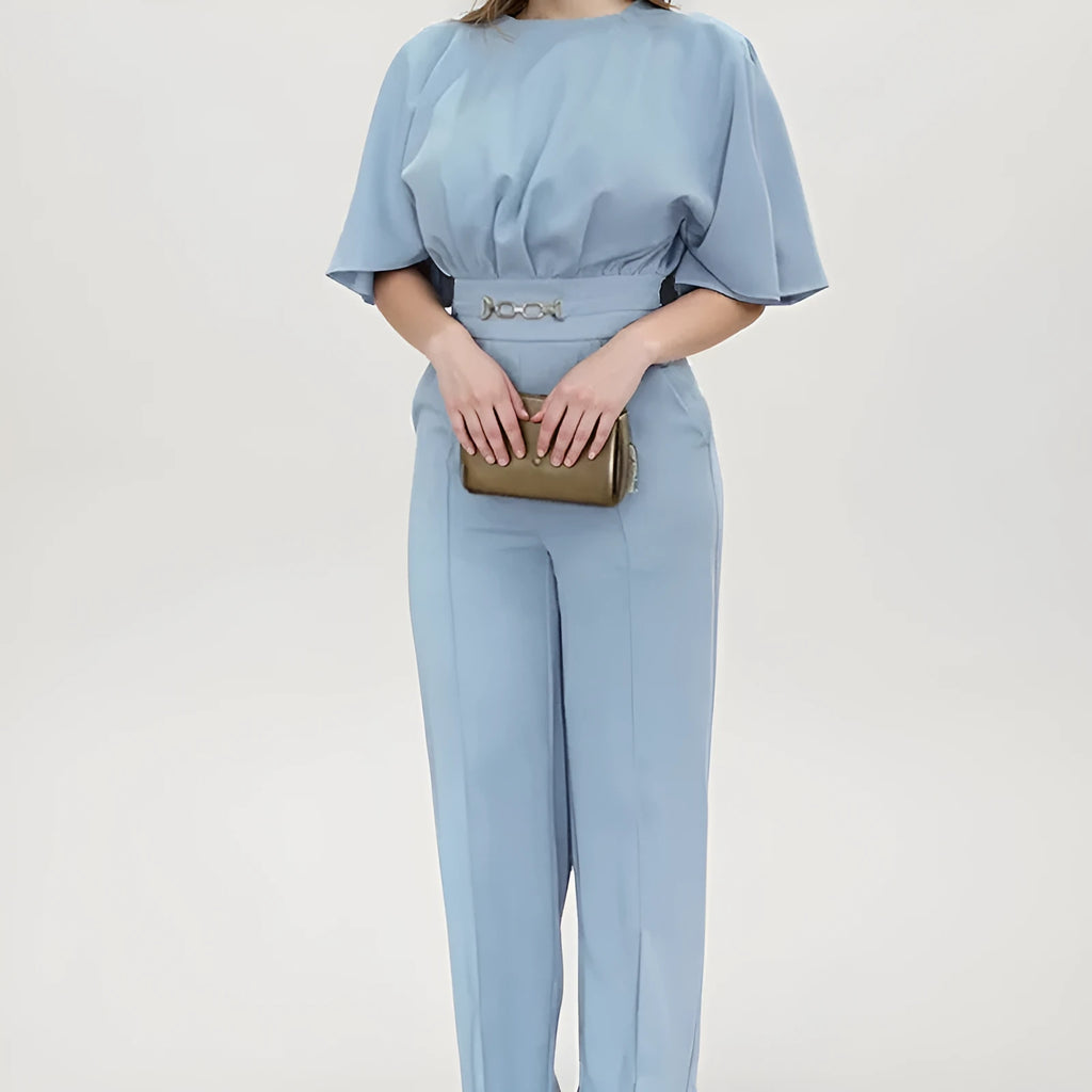 Blue polyester two-piece men's suit with long sleeves and trousers on a hanger