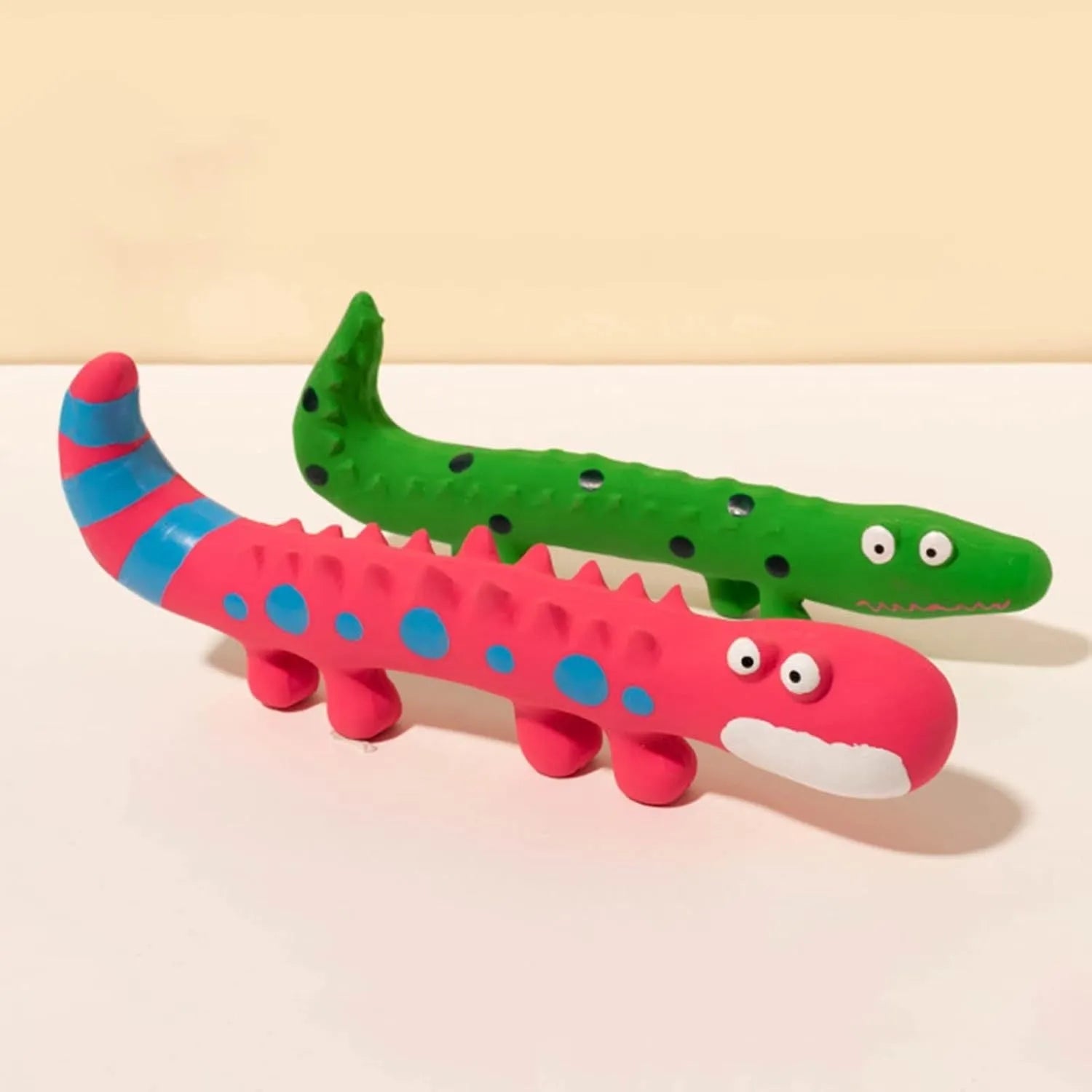 Green cartoon lizard shaped dog chew toy with squeaker for aggressive chewers
