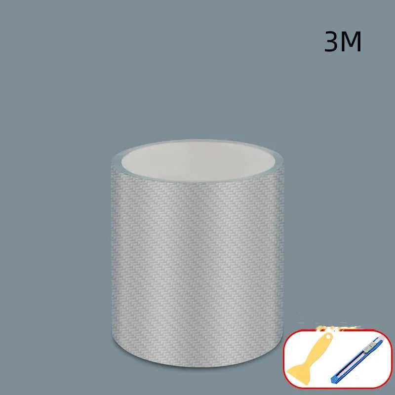 Roll of clear carbon fibre anti-collision film with scraper and utility knife for car door edges