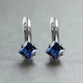 Copper women's earrings with inlaid zircon diamond design in blue, green, or colour variants.