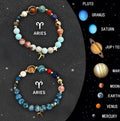 Set of twelve natural stone beaded bracelets showing different zodiac sign symbols