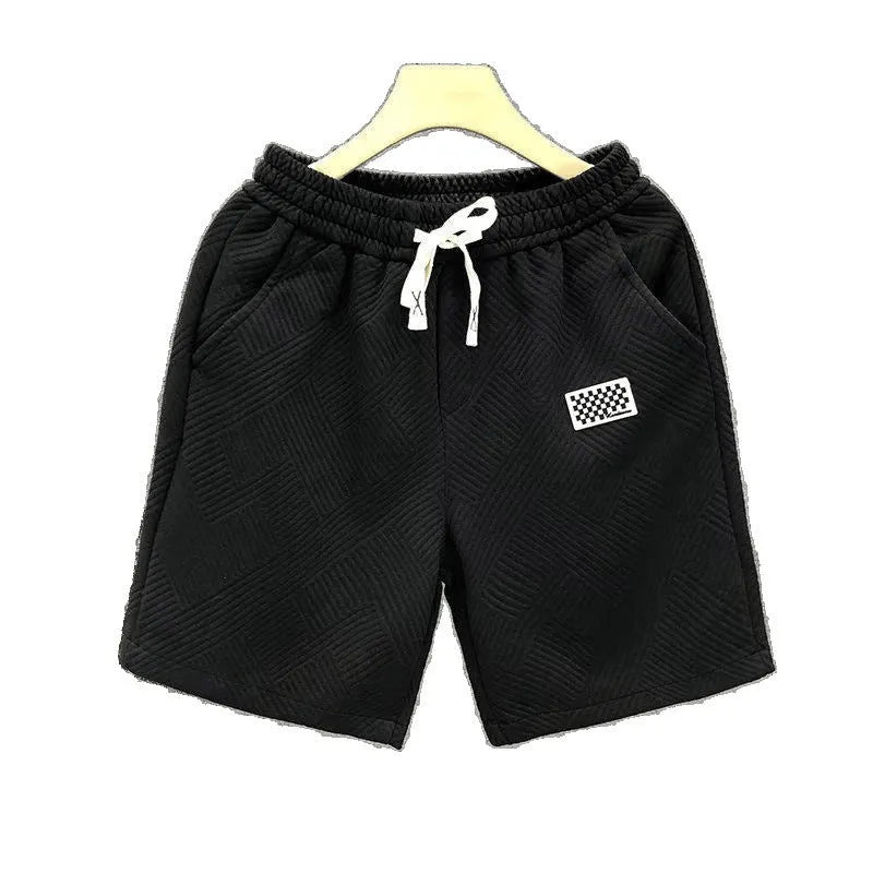Casual micro-elastic polyester sports shorts in solid white, black, or green colours with American style design