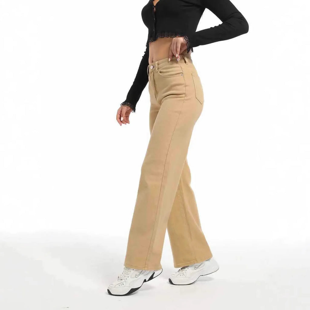Women's high waist straight leg wide jeans in apricot colour on a hanger.