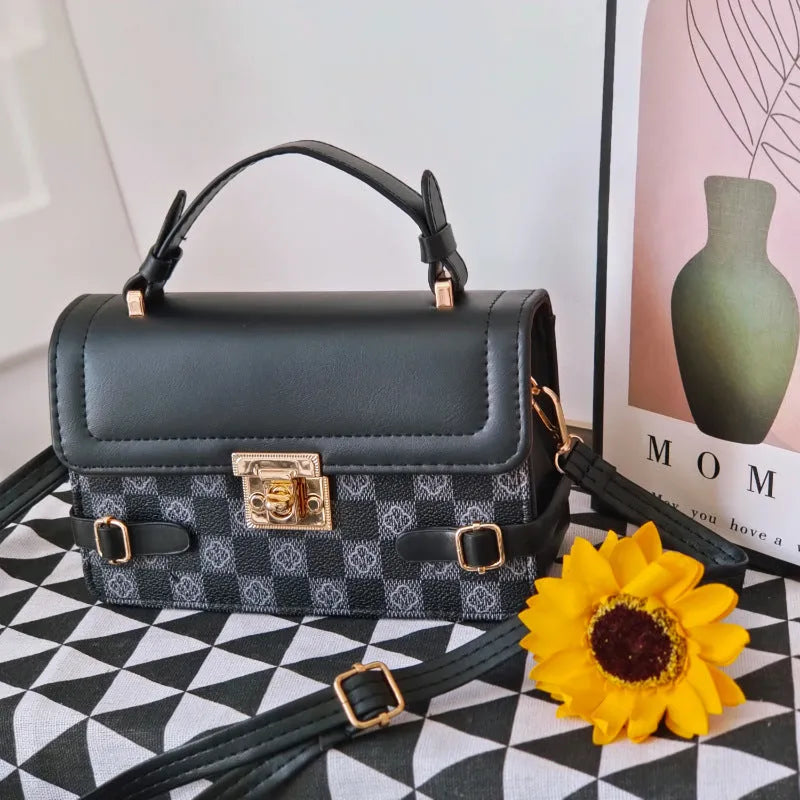 Small square ethnic crossbody bag in apricot PU leather with stitching and plaid patterns.
