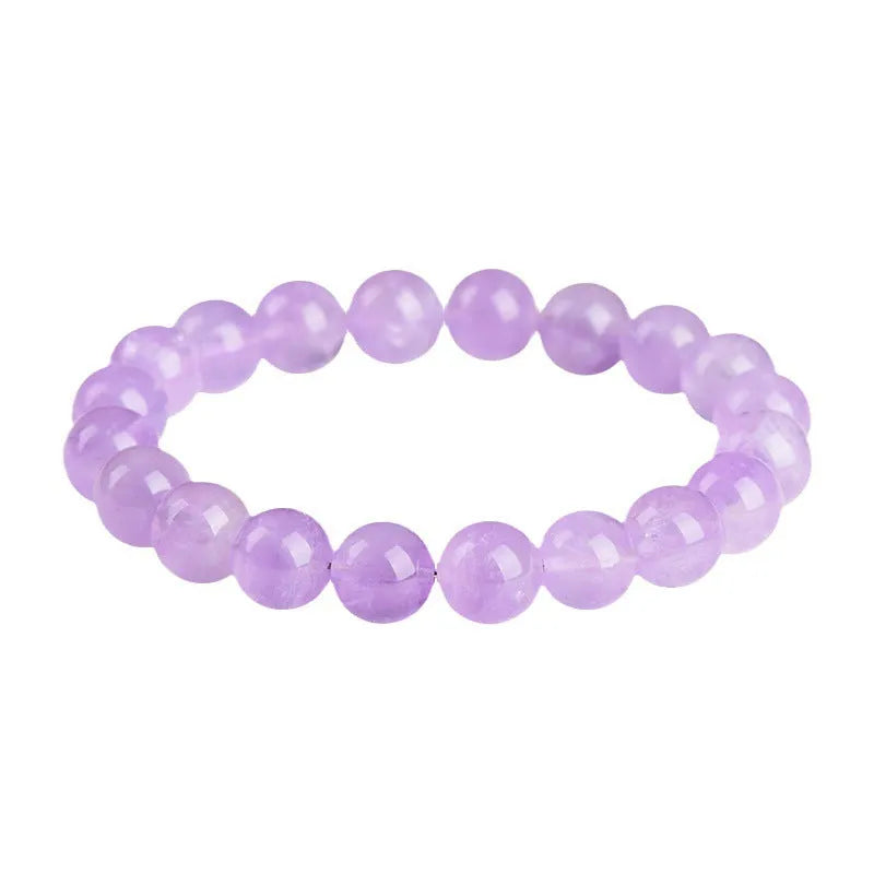 Lavender amethyst crystal bracelet with round beads showing water ripple pattern in light purple colour