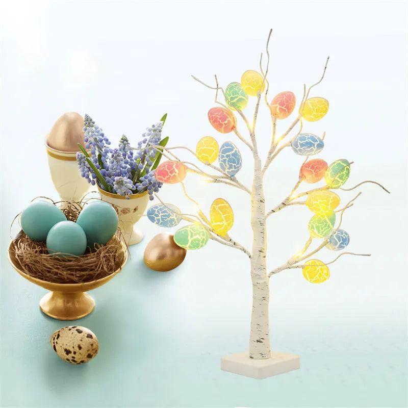 60cm birch-style Easter tree with warm white LED lights and cracked egg ornaments on a tabletop