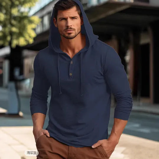 Men's dark blue cotton sports hoodie pullover with long sleeves on a hanger