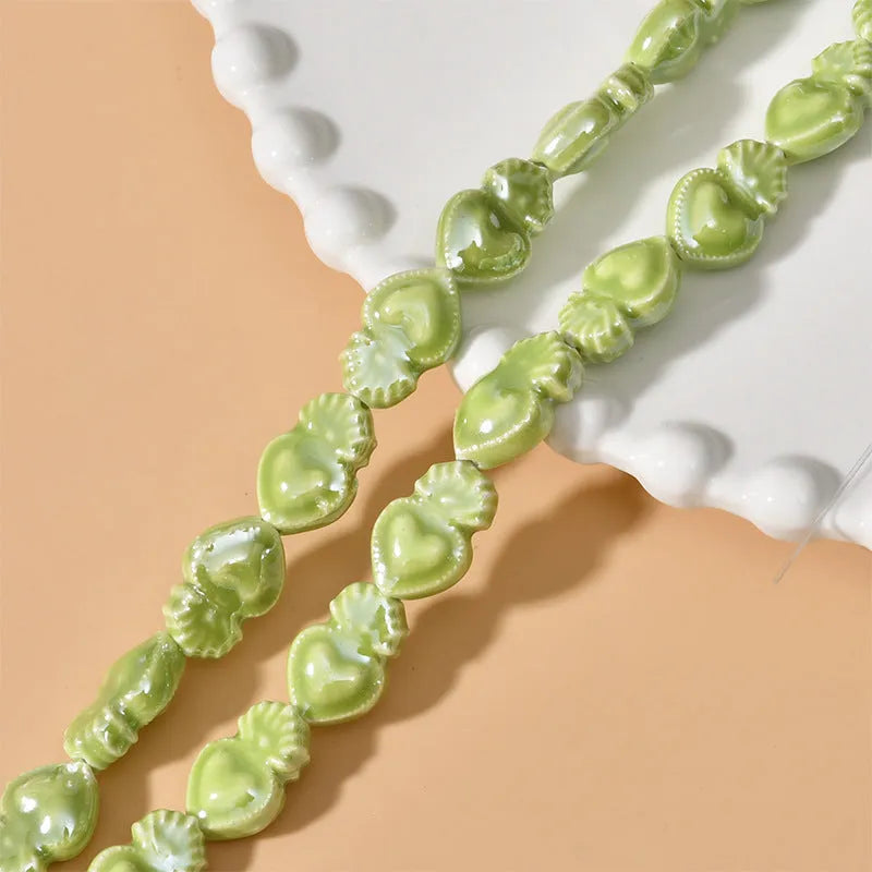 Ceramic love heart beads in assorted colours, 10x15mm size with straight 1.7mm hole