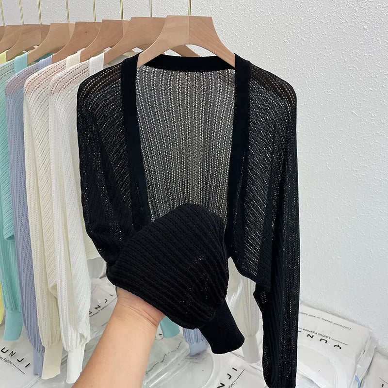 Hollow thin loose lantern sleeve sun protective blouse in apricot, front view for commute