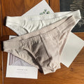 Men's cotton triangle briefs in solid colours with mid waist design showing apricot, black, white and skin colour options