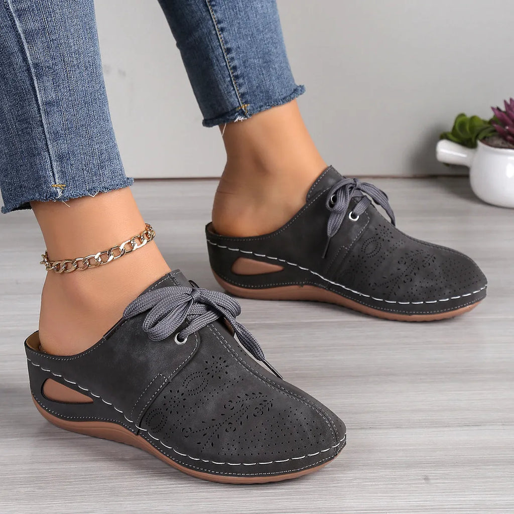 Women's light grey suede lace-up wedge slippers with a hollow-out rubber sole.