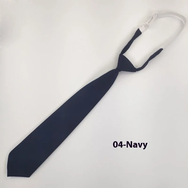 Navy blue cotton bow tie with arrow style design measuring 35cm by 7cm