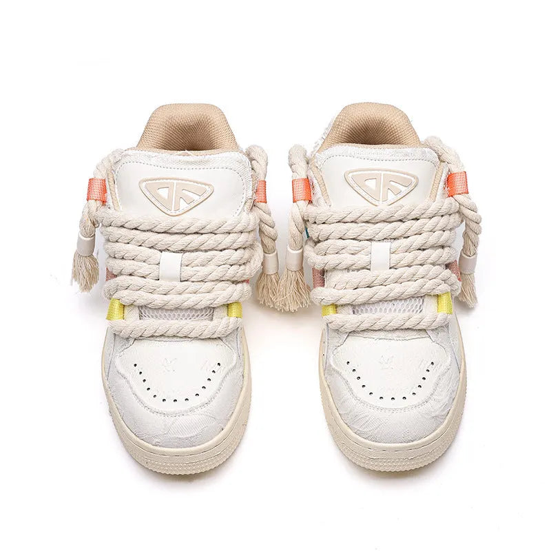 Creamy white retro skateboard shoes with old damage style, lace-up front, platform heel and round toe