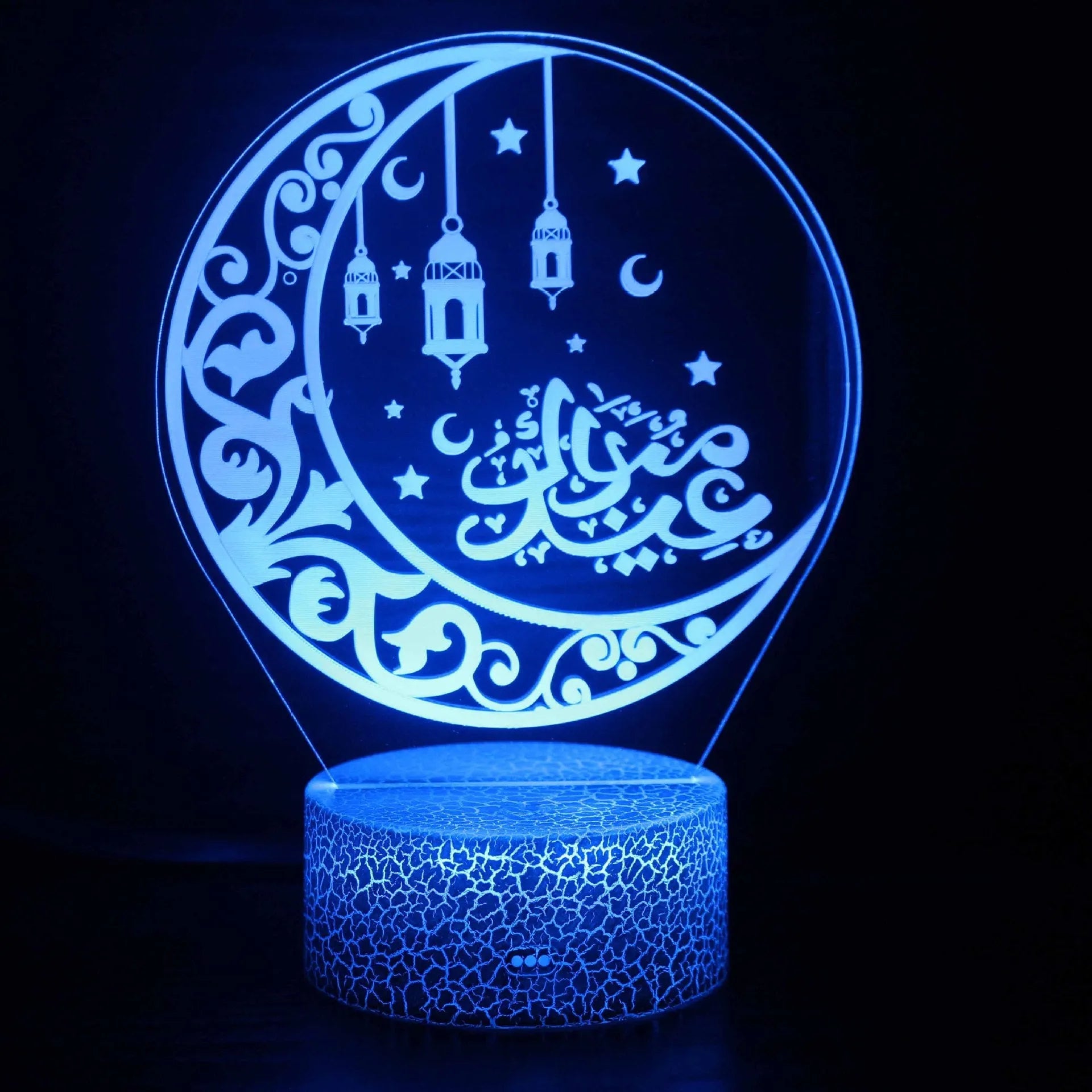 3D small night lamp with touch and remote control showing colourful LED illumination on a bedside table