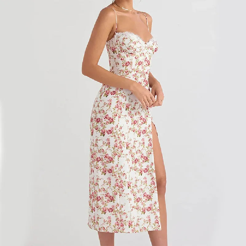 Blue lace floral print women's dress with suspender straps and a high thigh slit.