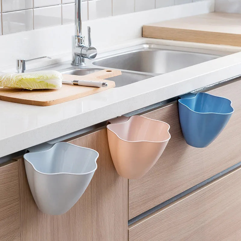 Compact Nordic cabinet garbage can with lid in blue, grey, and pink colour options, size 21x16x14cm