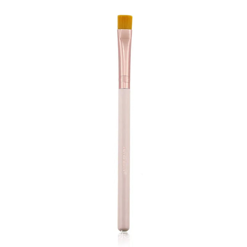 26 pink makeup brushes with wooden handles displayed in a open pink PU travel case