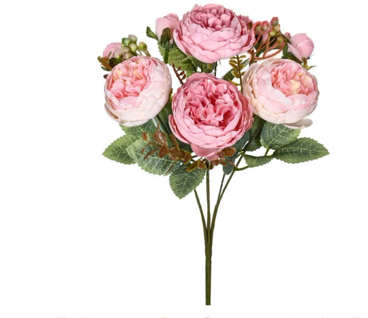 Artificial silk peony bouquet in a champagne colour for home or wedding decoration.