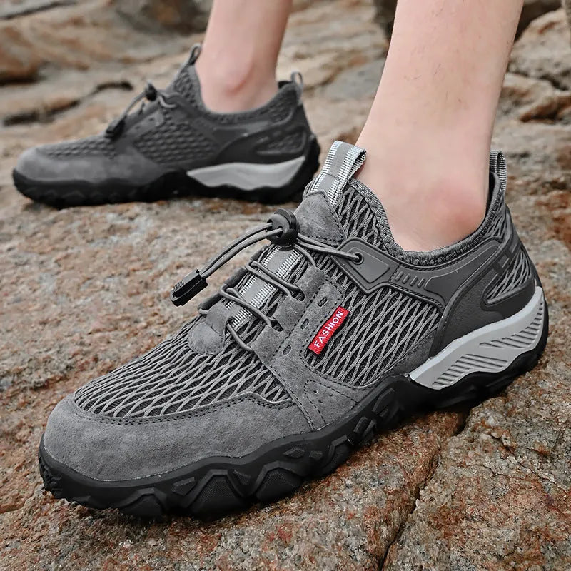 Men's summer leather mesh breathable outdoor hiking shoes, low top, black colour, side view showing elastic band and round toe