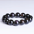 Genuine crystal icy obsidian Pi Xiu bracelet in geometric ethnic style on a neutral background.
