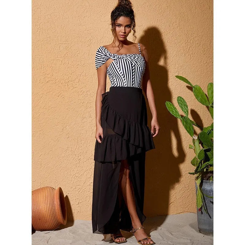Women's one-piece ruffled striped swimsuit with black skirt in polyester fabric