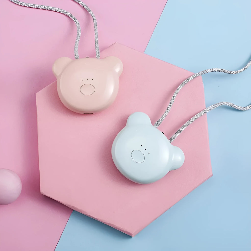 Mini USB rechargeable wearable air purifier necklace in pink, showing compact dimensions.