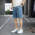Men's loose straight fifth pants in green polyester fabric with South Korea style casual design