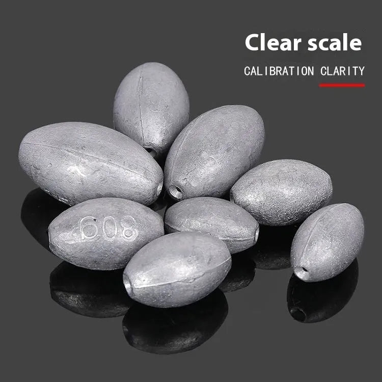 Olive-shaped sea fishing lead sinker with scale pattern texture and plastic core