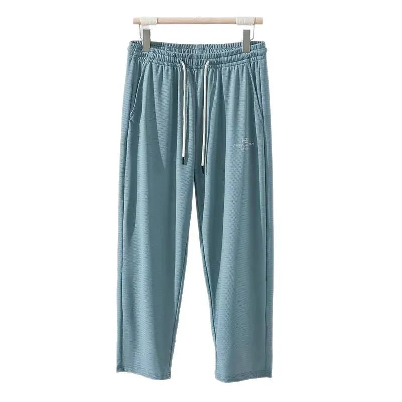 Men's ice silk thin breathable quick-drying casual pants in solid colour with drawstring high waist
