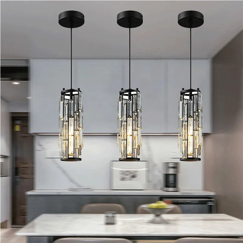 Industrial style LED crystal droplight in black finish with metal frame and crystal pendant detail