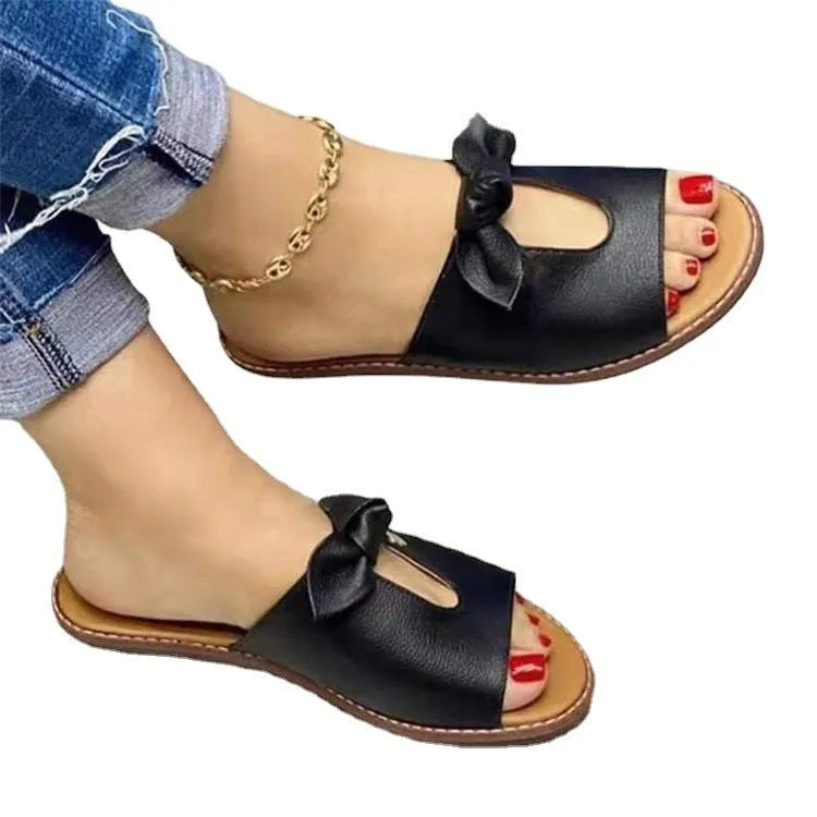 Ladies fish mouth sandals with a bow on the artificial PU upper, shown in black, pink, and gold colours.