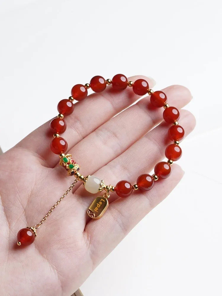 Natural crystal red agate bead bracelet with gold plating finish for women, single circle style on white background