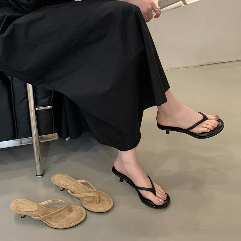 Women's open-toed stiletto sandals with flat head, rubber sole, in classic black, side view